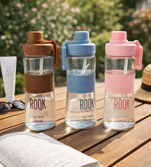 Glass Water Bottle with Silicone Grip, 750ml Transparent Bottles Assorted (pack of 1) deal from pepperfry